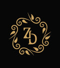 A gold monogram logo featuring the letters 'Z' and 'D' enclosed in an ornate circular vine wreath with leaves, centered on a solid black background.